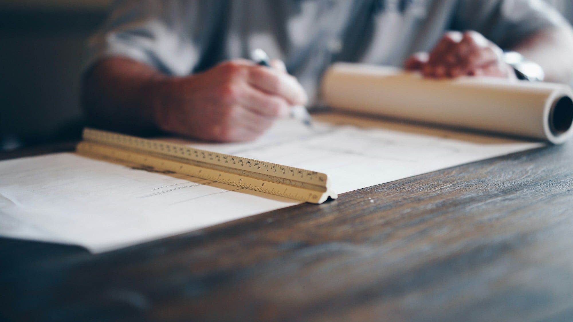 Drawings being marked up with a scale rule